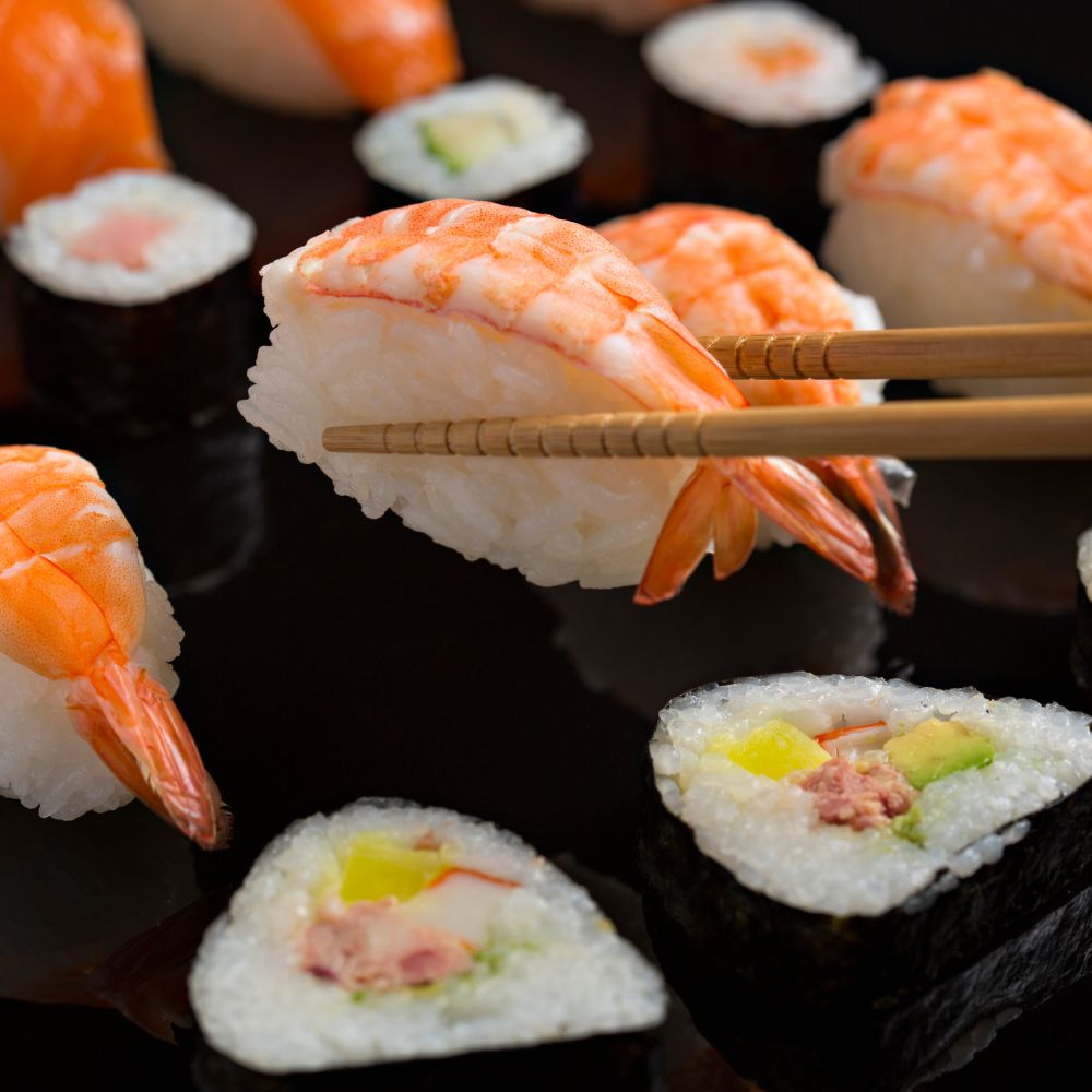 sushi-close-up-japanese-food-on-black-background-2Z9YA3N.jpg